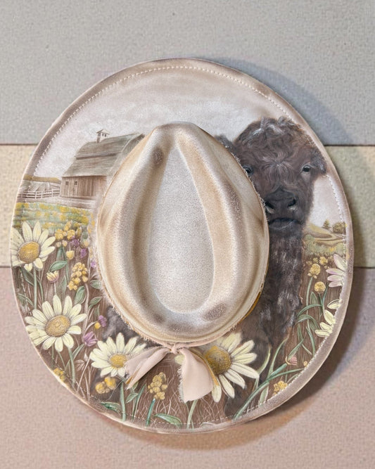 Painted hat with barn and calf