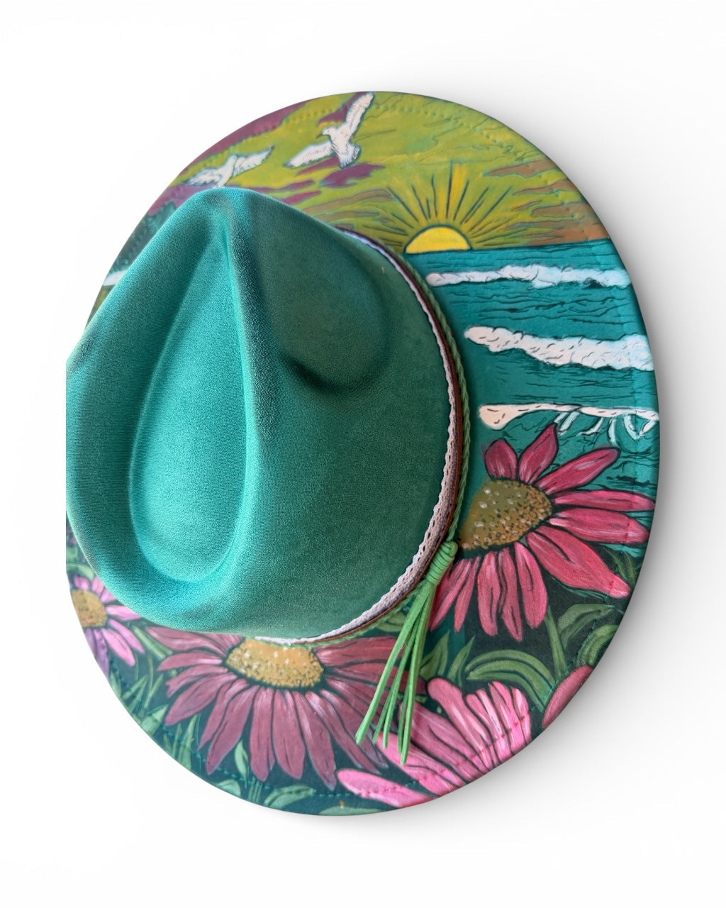Colorful hat with floral and nature design on a white background