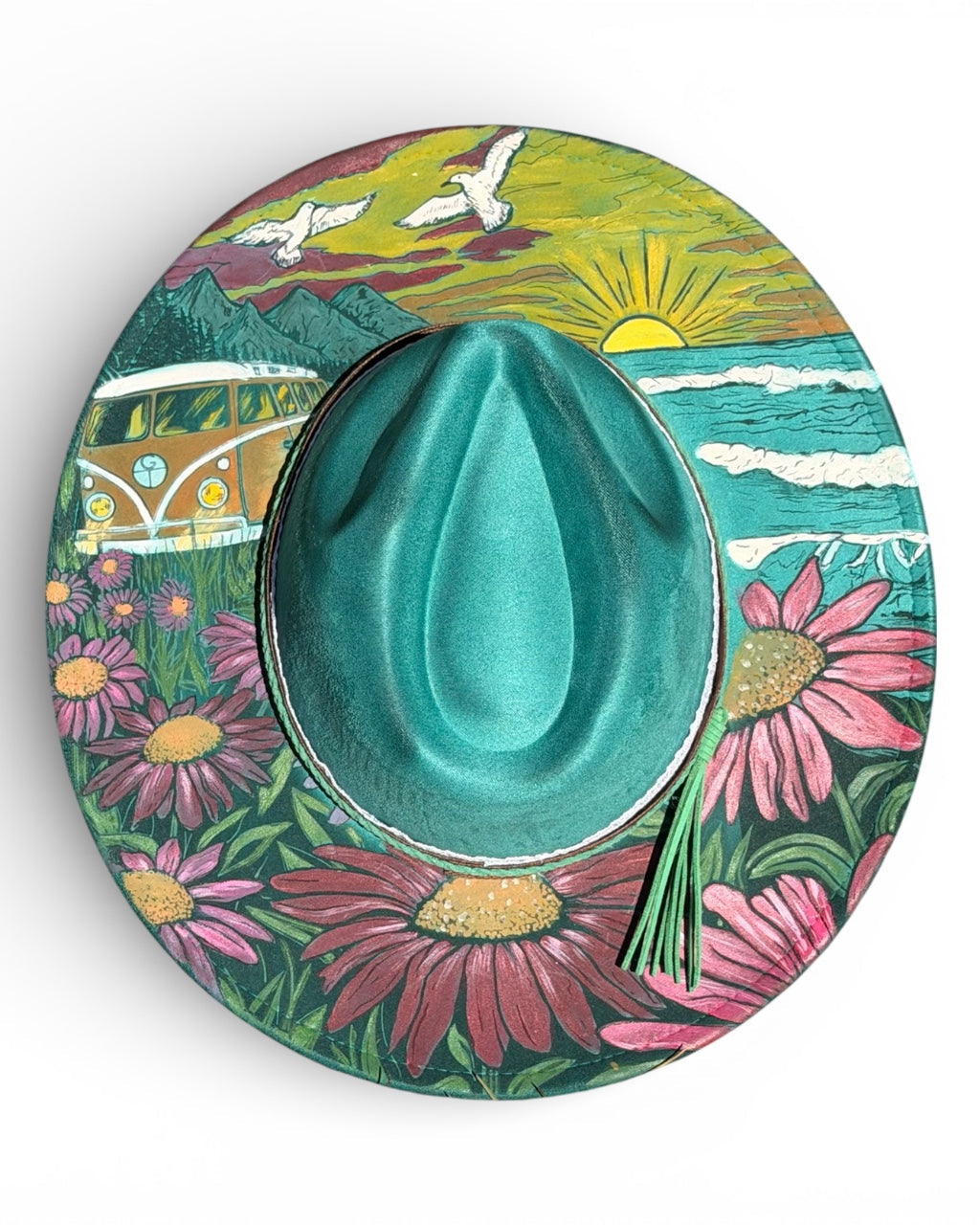 Colorful hat with a scenic design featuring flowers, mountains, and a van.