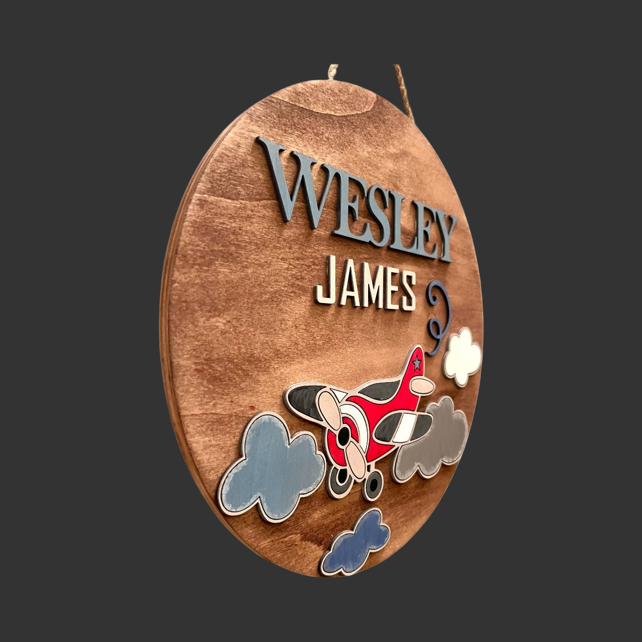 Wooden plaque with custom text and airplane design